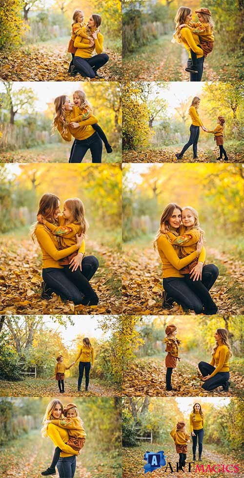       -   /  Mother and daughter in autumn park - Raster clipart