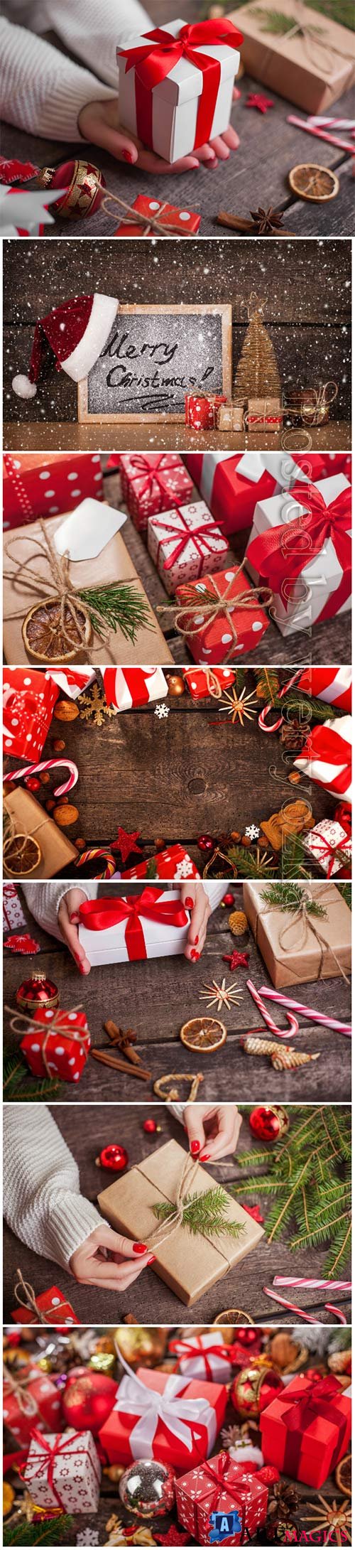 Christmas background with fir branches, candles, gifts and Christmas decorations